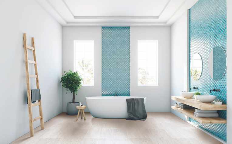 beach house bathroom with stone look luxury vinyl floors and blue tile accent walls